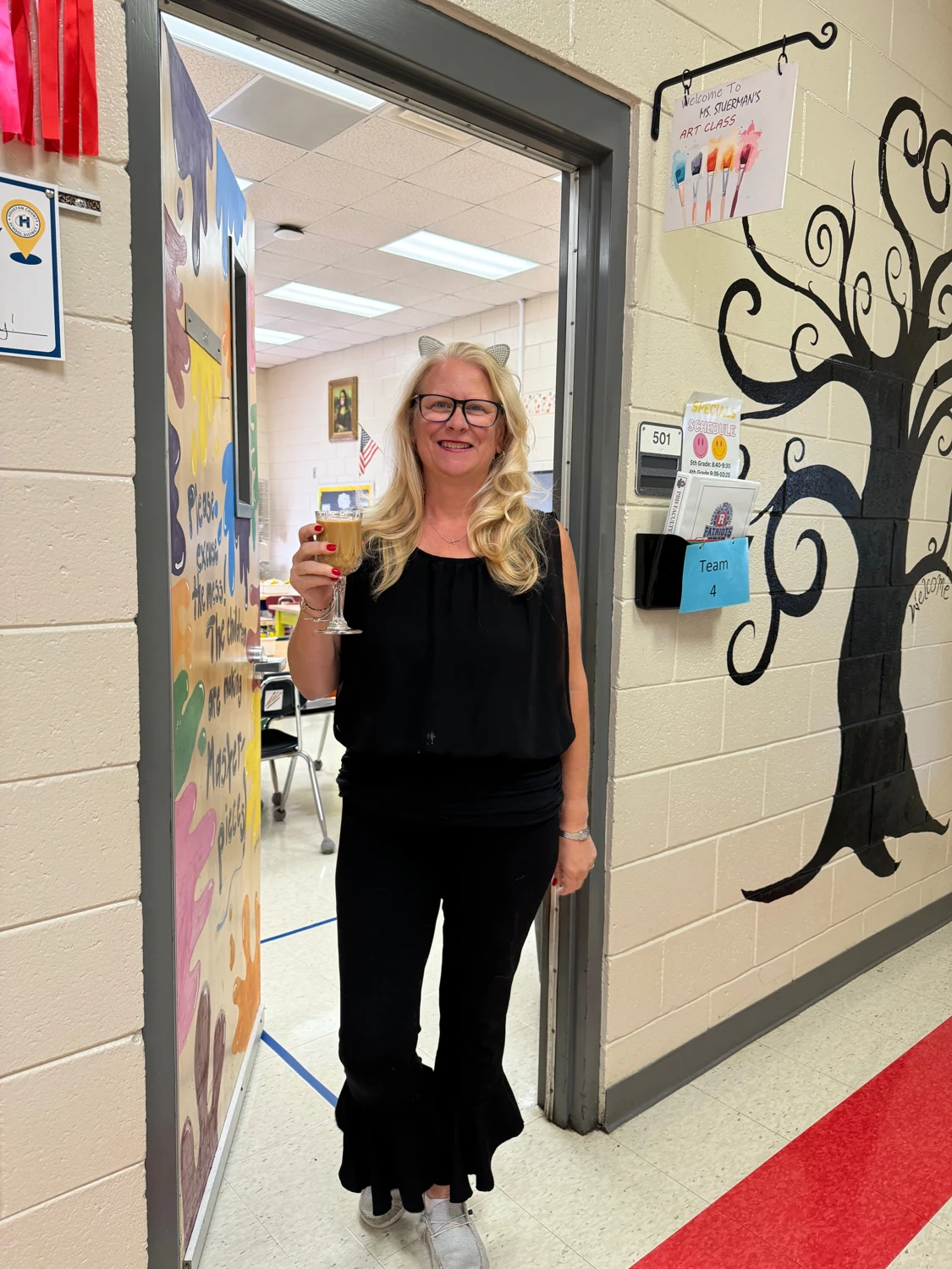 Beth Stuerman standing in the doorway of her art classroom